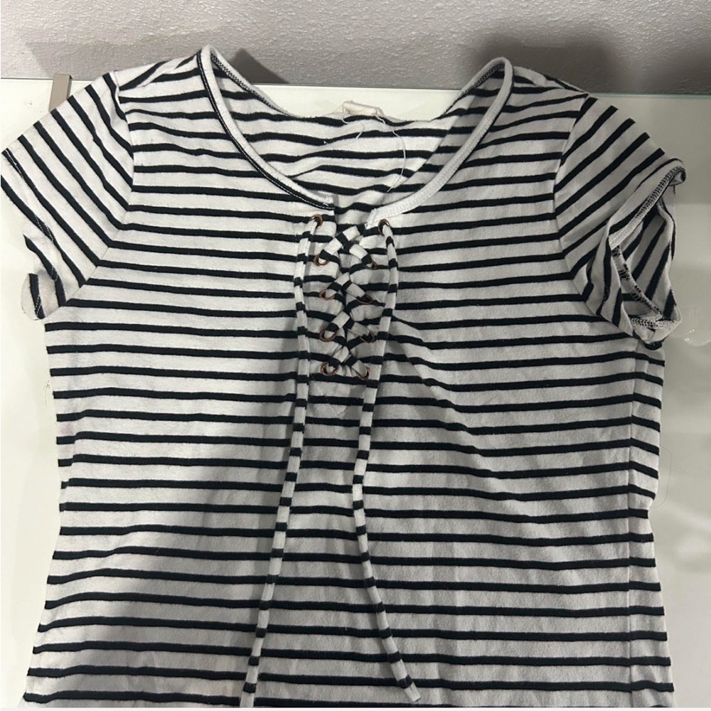 Aeropostale Black and white striped top with lace up detail on the front